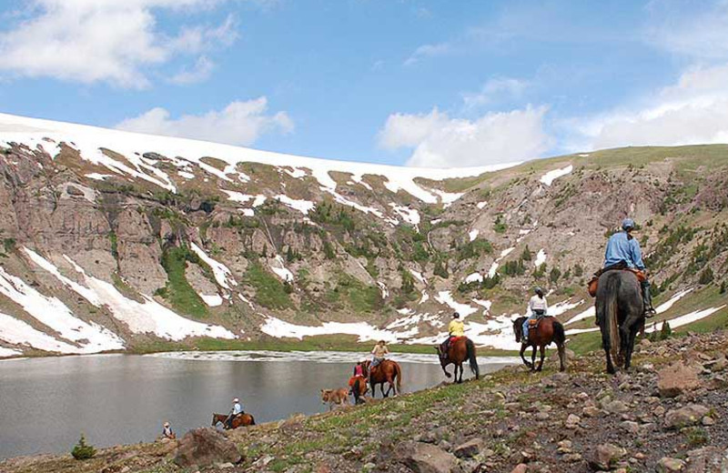 Horseback riding at Triangle X Ranch.