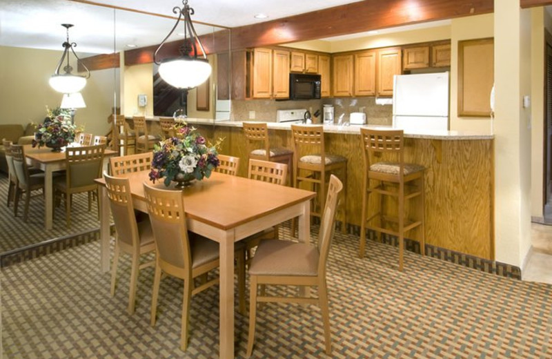 Suite kitchen and dining room at Whispering Woods Resort.