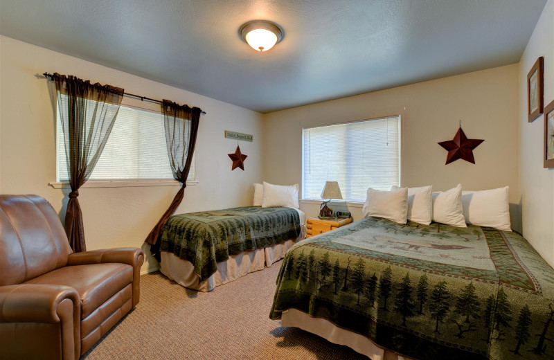 Cabin bedroom at Morrison's Rogue River Lodge.