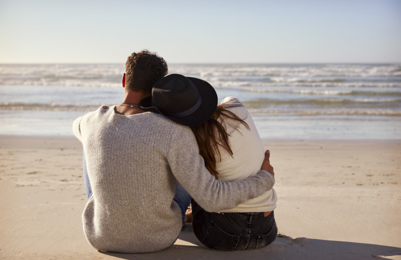 Couple on beach at Clarion Resort Fontainebleau Hotel.