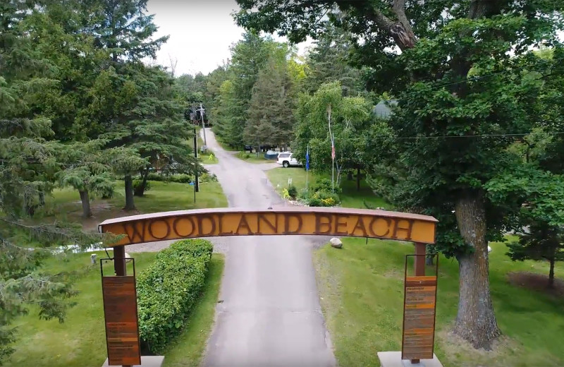 Welcome sign at Woodland Beach Resort.