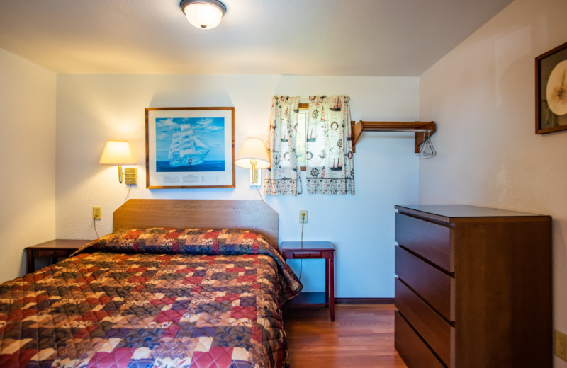 Cabin bedroom at Oceanside Ocean Front Cabins.