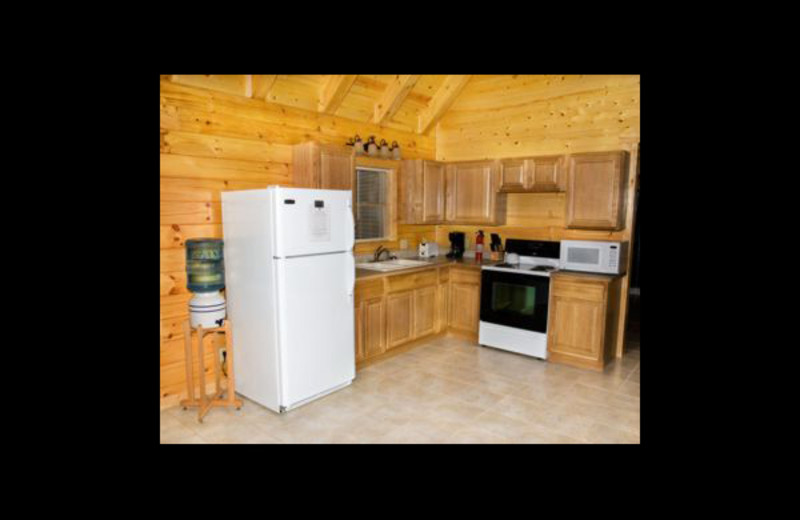 Cabin kitchen at Hummingbird Hill Cabin Rentals.