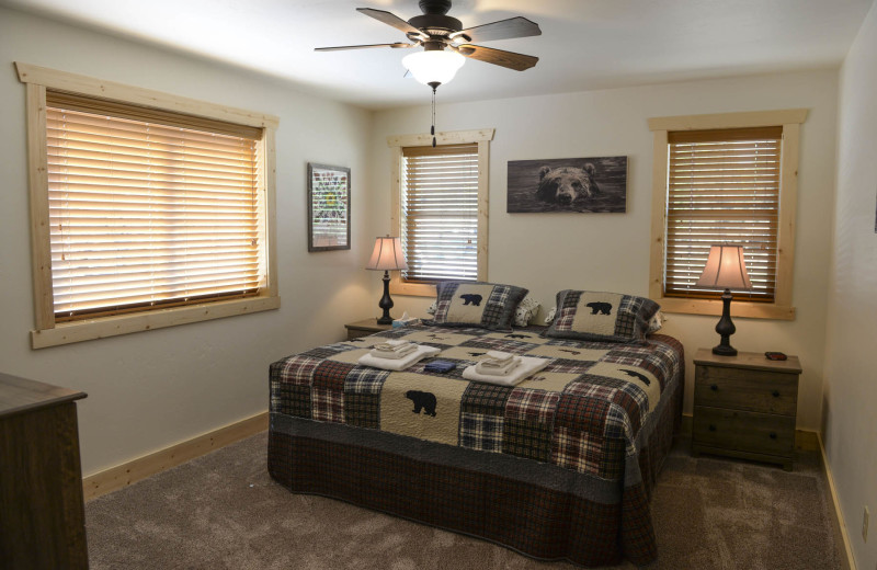 Cabin bedroom at Three Rivers Resort & Outfitting.