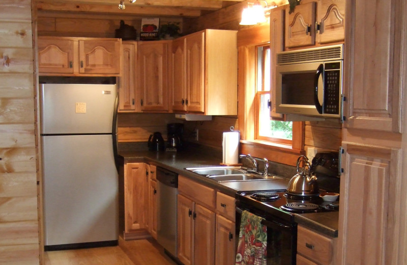 Cabin kitchen at Creeks Crossing Cabins.