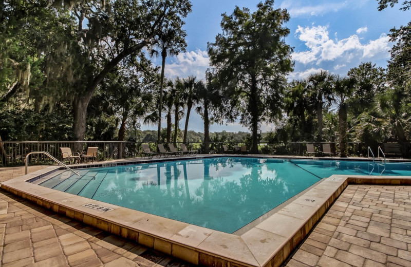 Rental outdoor pool at Amelia Rentals and Management Services.