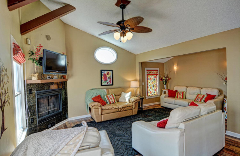 Vacation rental living room at Century 21 Action Inc. 