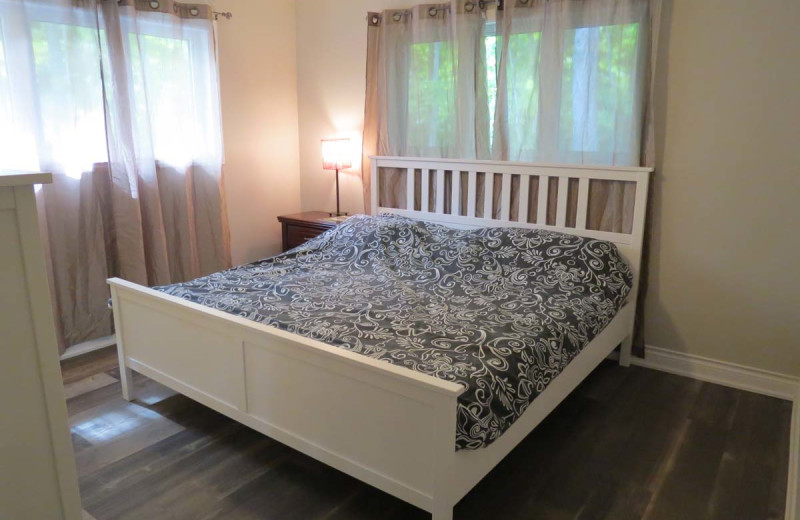 Rental bedroom at All-Season Cottage Rentals.