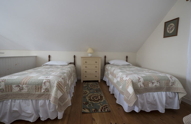 Cottage bedroom at Sunapee Harbor Cottages.