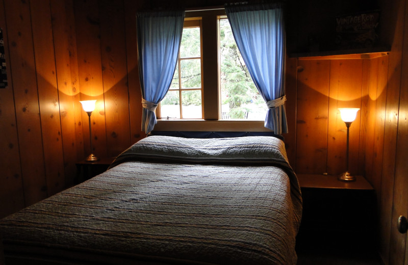 Cottage bedroom at Shakti Cove Cottages.