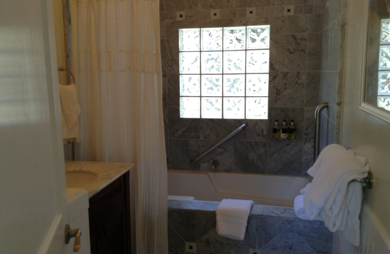 Guest bathroom at Lamp Lighter Inn & Sunset House Suites.