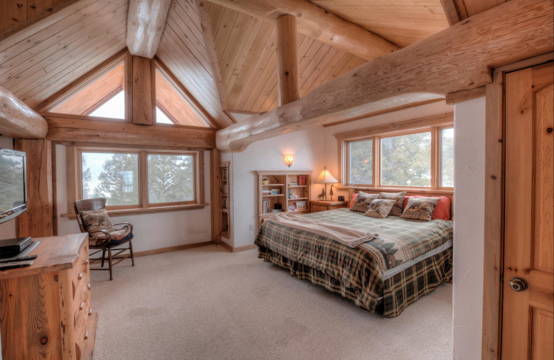 Cabin bedroom at Black Wolf Lodging.