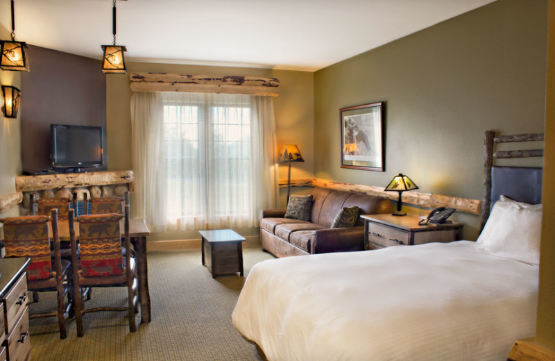 Guest bedroom at Hope Lake Lodge & Indoor Waterpark.