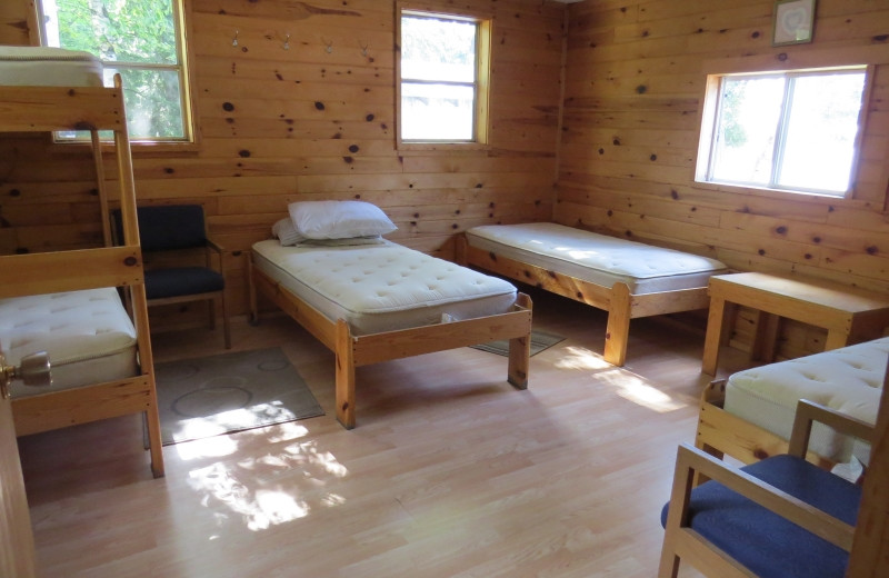 Cabin bedroom at Clark's Resorts & Outposts.