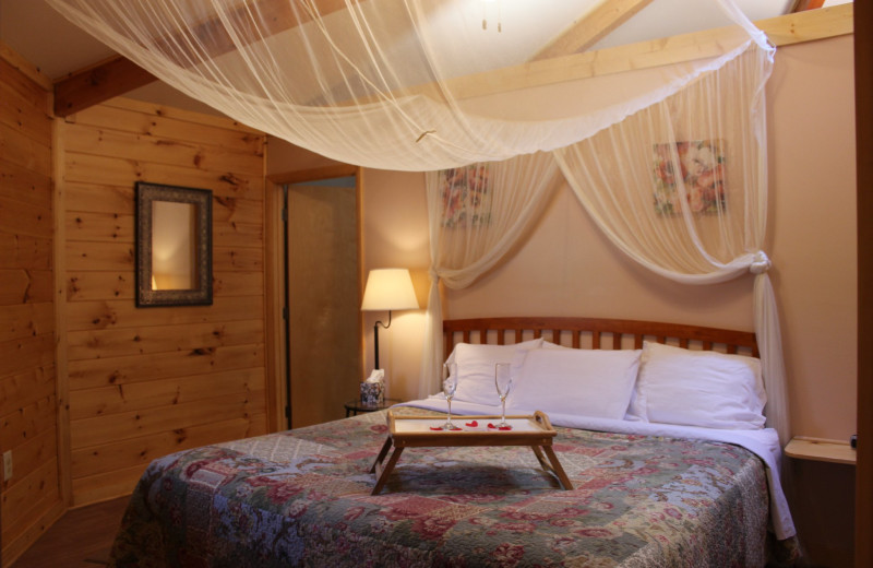 Cabin bedroom at Country Road Cabins.