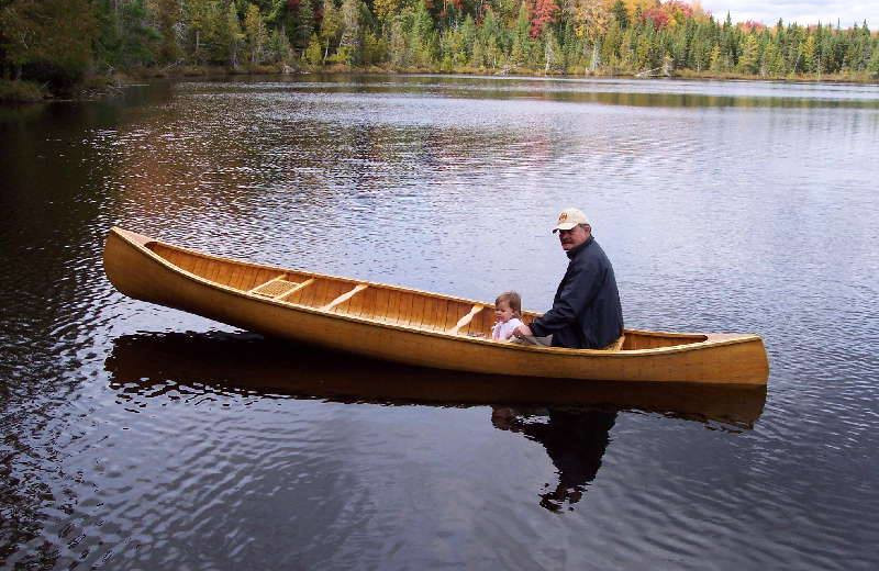 Canoeing on Eagle Lake near Haliburton, Ontario at All-Season Cottage Rentals.