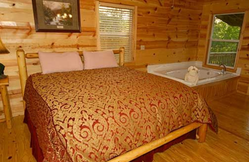 King Jacuzzi Bedroom at Baskins Creek Cabin Rentals 