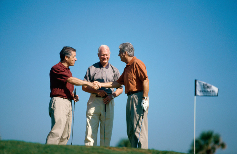 Playing a round of golf at Shenvalee Golf Resort.