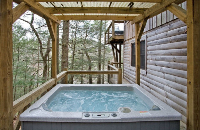 Rental hot tub at Dogwood Cabins LLC.