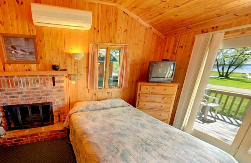 Cabin bedroom at Hiawatha Beach Resort.