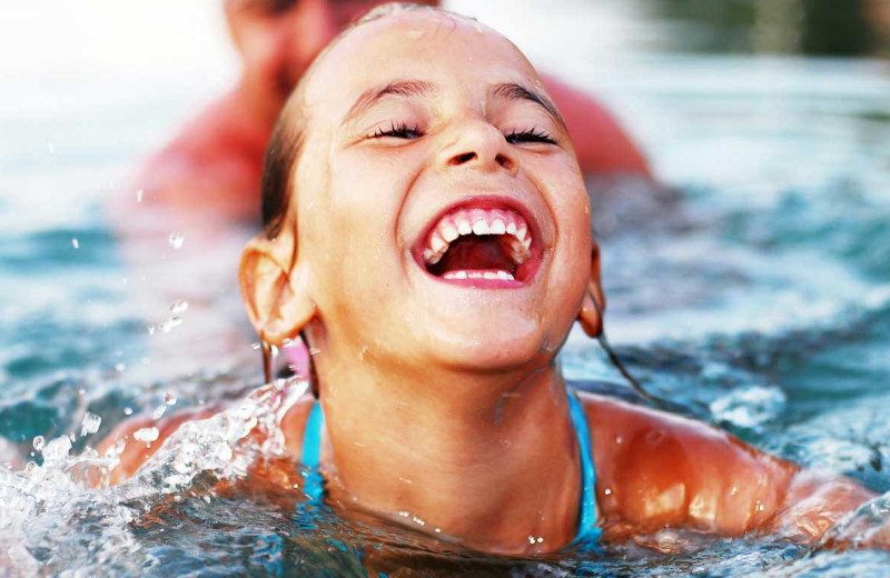 Kid swimming at Tapatio Springs Hill Country Resort.