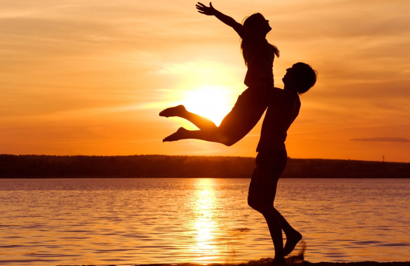 Couple on beach at Hillcrest Guest House.