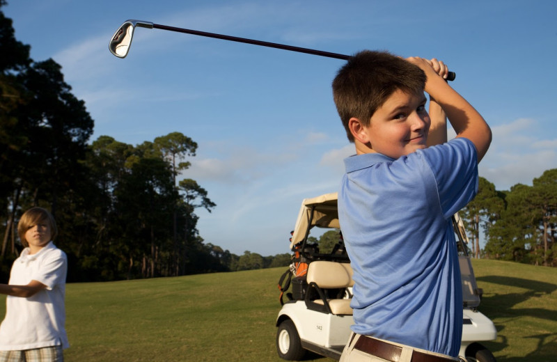 Playing golf at Hampton Inn & Suites Jekyll Island.