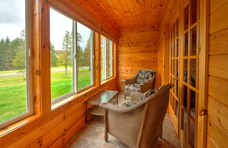 Lakeside House porch at Jackson's Lodge and Log Cabin Village.