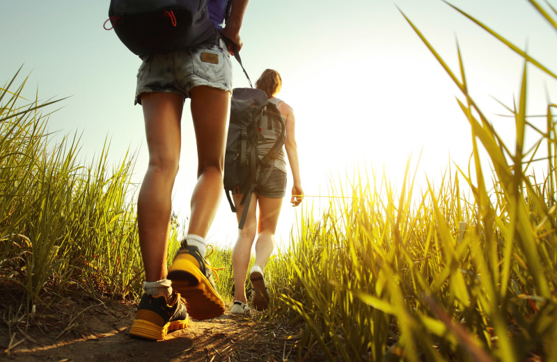 Couple hiking at Oceanside Ocean Front Cabins.