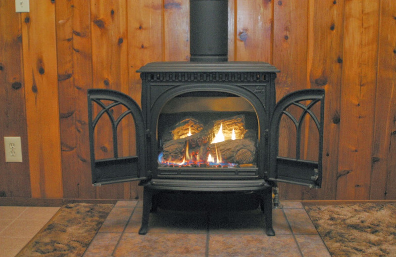 Cabin fireplace at Tsasdi Resort.