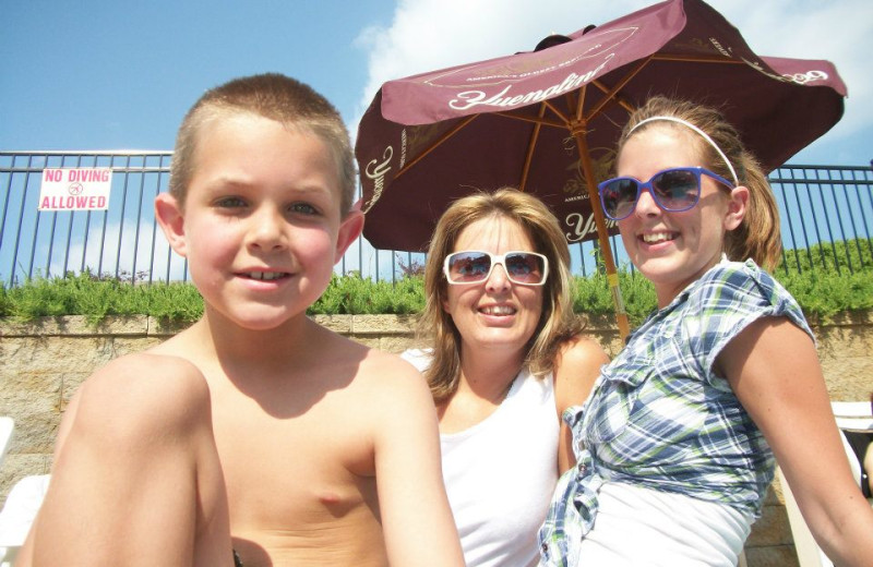 Family at the pool at Copperhead Lodge.