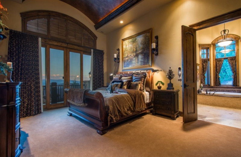 Rental bedroom at Utopian Luxury Vacation Homes.