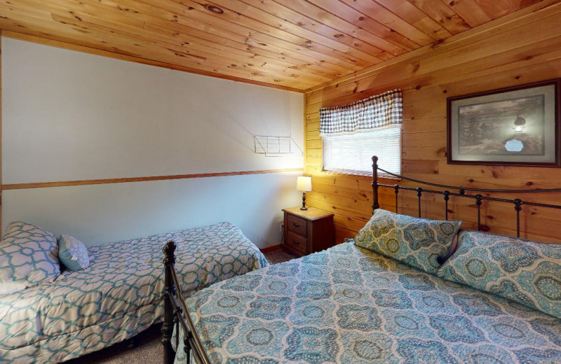 Cabin bedroom at 1st Choice Cabin Rentals.