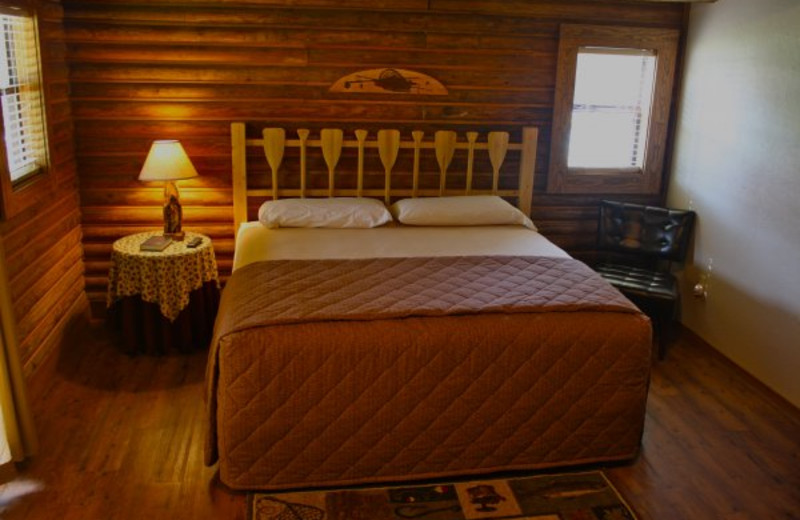 Cabin bedroom at Lindsey's Rainbow Resort.