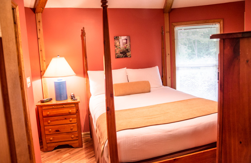 Cabin bedroom at Asheville Cabins of Willow Winds.