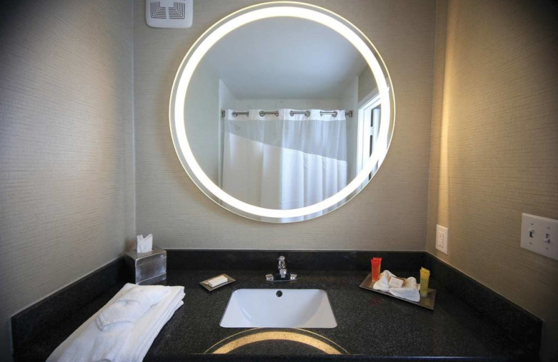 Guest bathroom at Surfbreak Oceanfront Hotel.