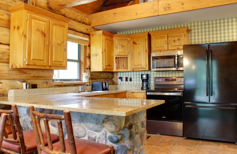 Rental kitchen at Sand County Vacation Rentals.
