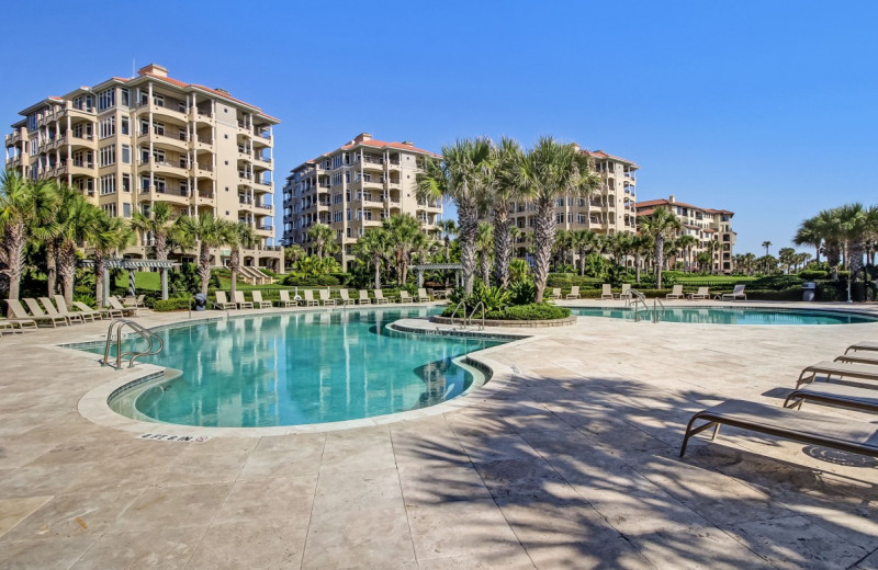 Rental outdoor pool at Amelia Rentals and Management Services.