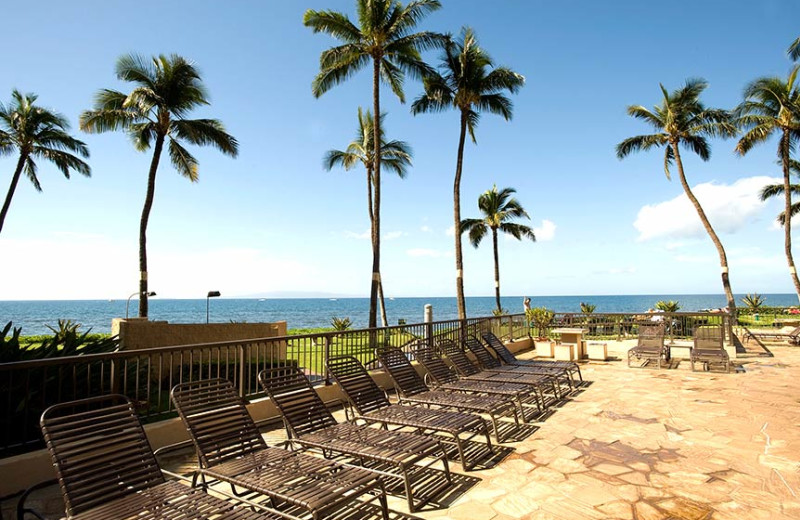 Relax by the pool at Sugar Beach Resort.