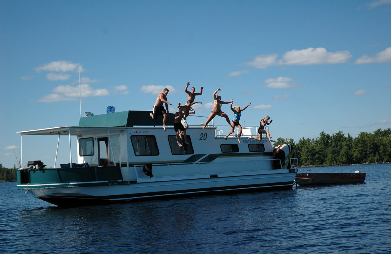 Jumping into the lake at Rainy Lake Houseboats.