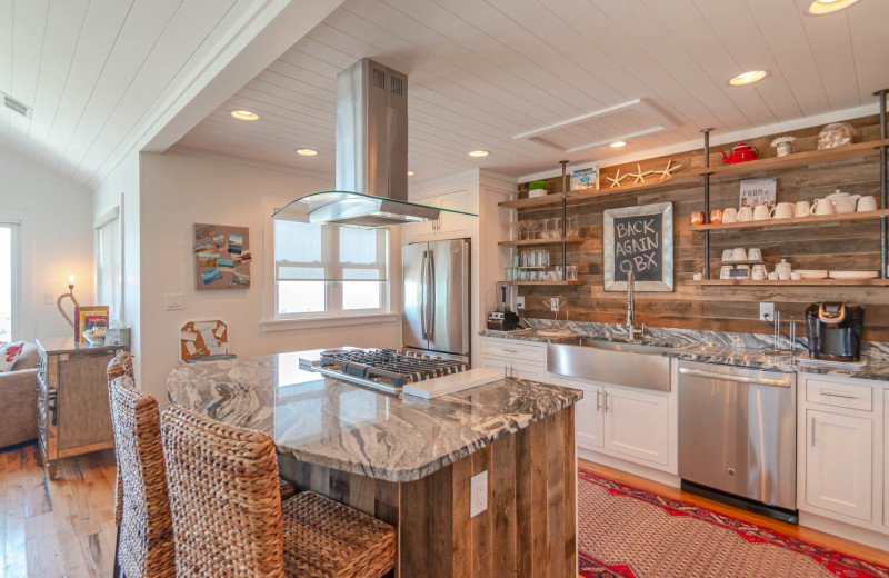 Rental kitchen at Joe Lamb Jr. & Associates Vacation Rentals.