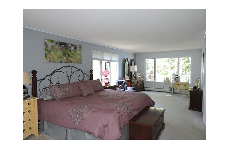 Rental bedroom At the Lakes Vacation Rentals.