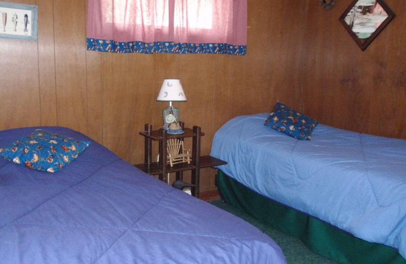 Cabin bedroom at Golden Rule Resort.