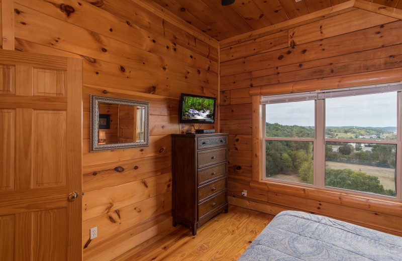 Bedroom at American Patriot Getaways - Pigeon Forge View.