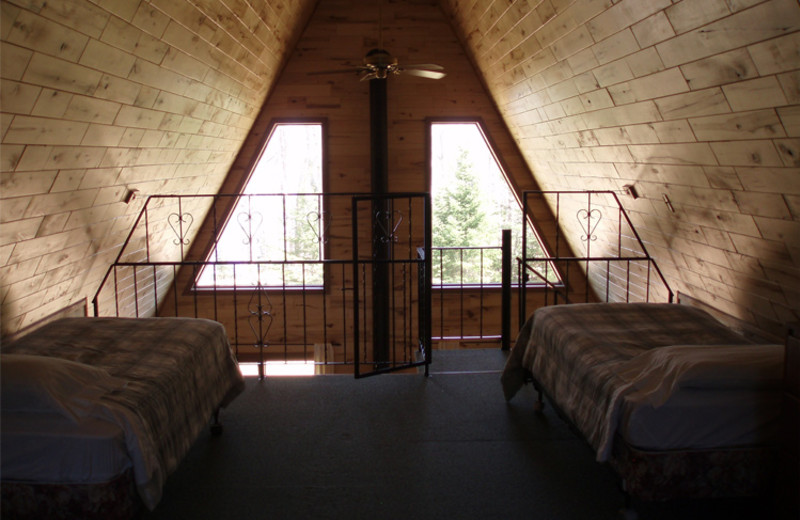 Loft bedroom at Cedar Cove Cabins.