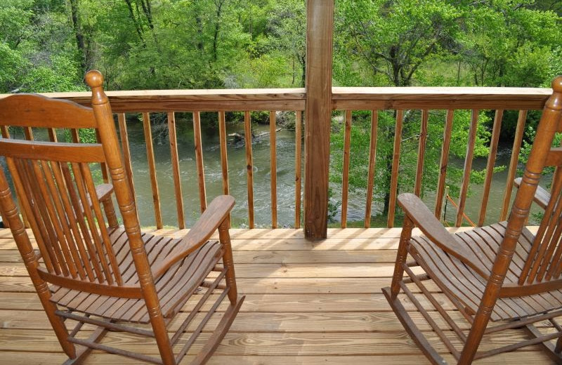 Cabin deck view at Cuddle Up Cabin Rentals.