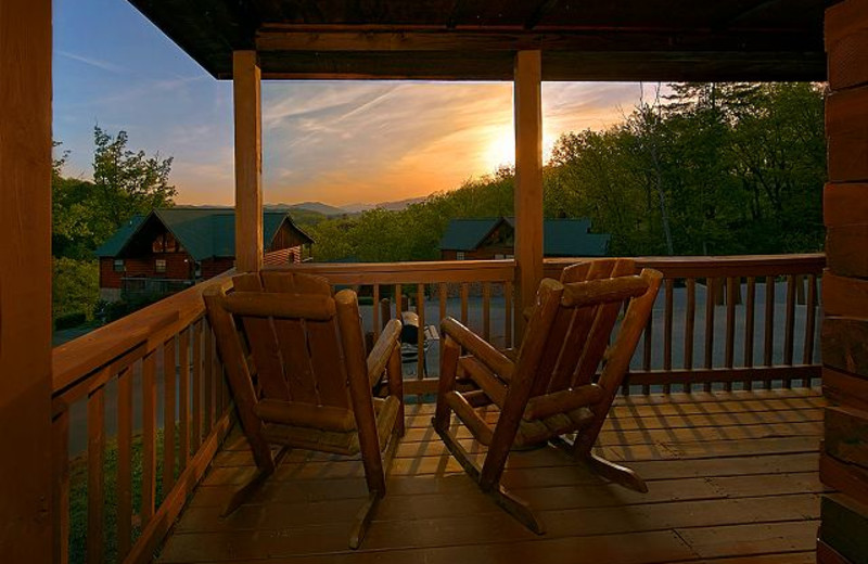 Relaxing on the deck at Aunt Bug's Cabin Rentals, LLC.