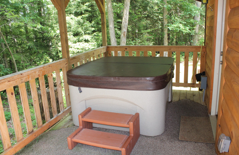 Cabin hot tub at Country Road Cabins.