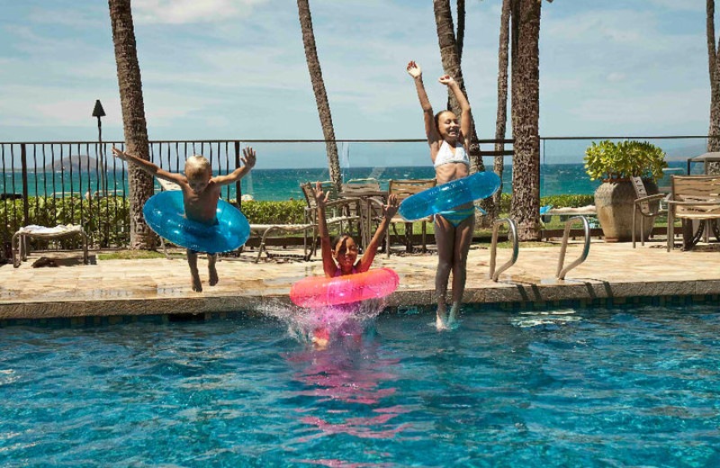 Jumping in the pool at Mana Kai Maui.