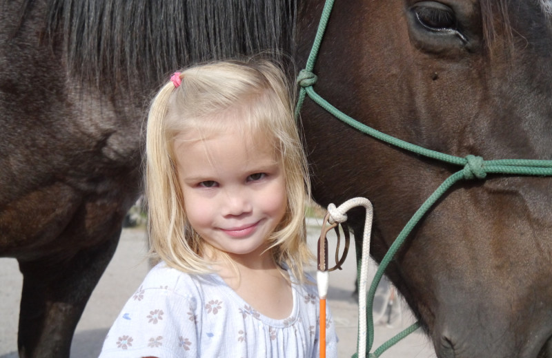 Child and horse at Rocking Z Ranch.